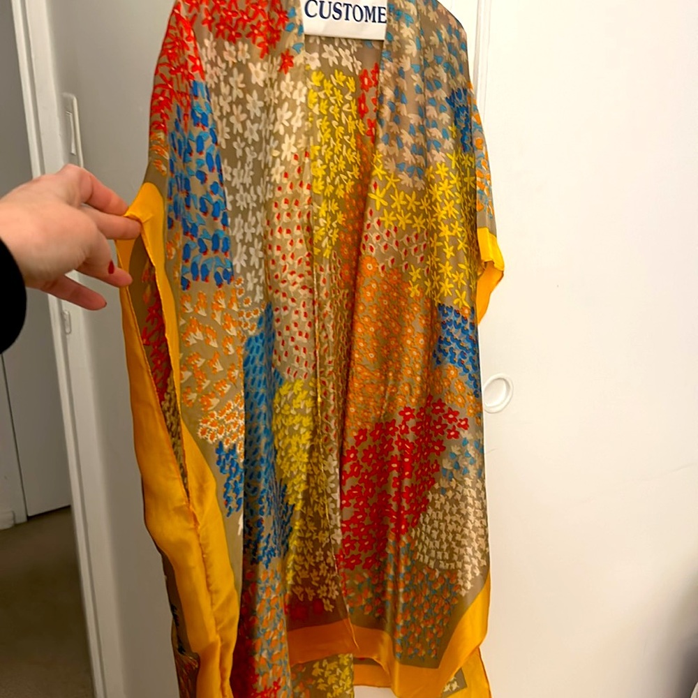 Vibrant colors in this kimono. Worn 1x. Recently dry cleaned